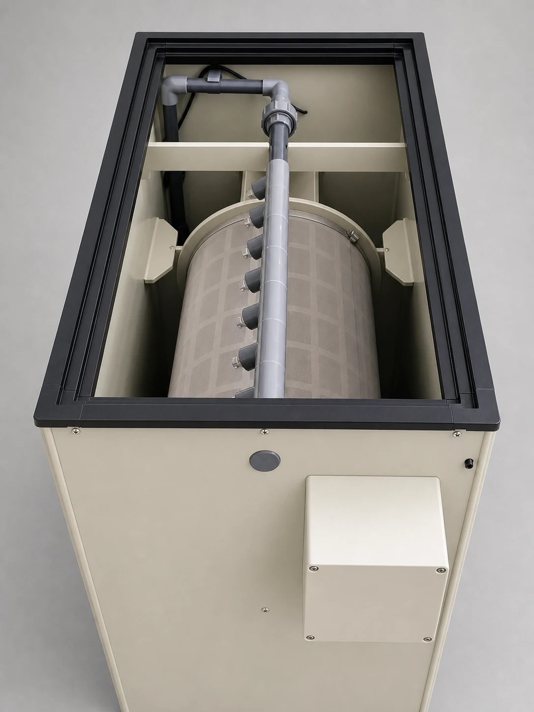 Aquaculture rotary drum filter open chamber showing drum screen and spray pipe